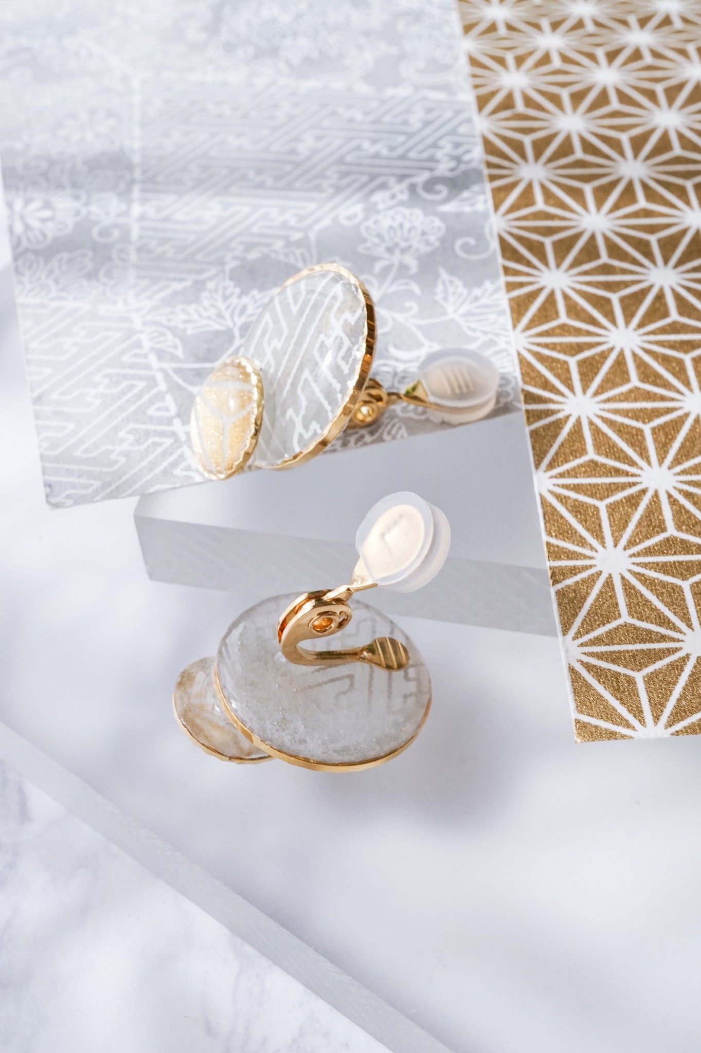 Kumi earrings -Sayagata-